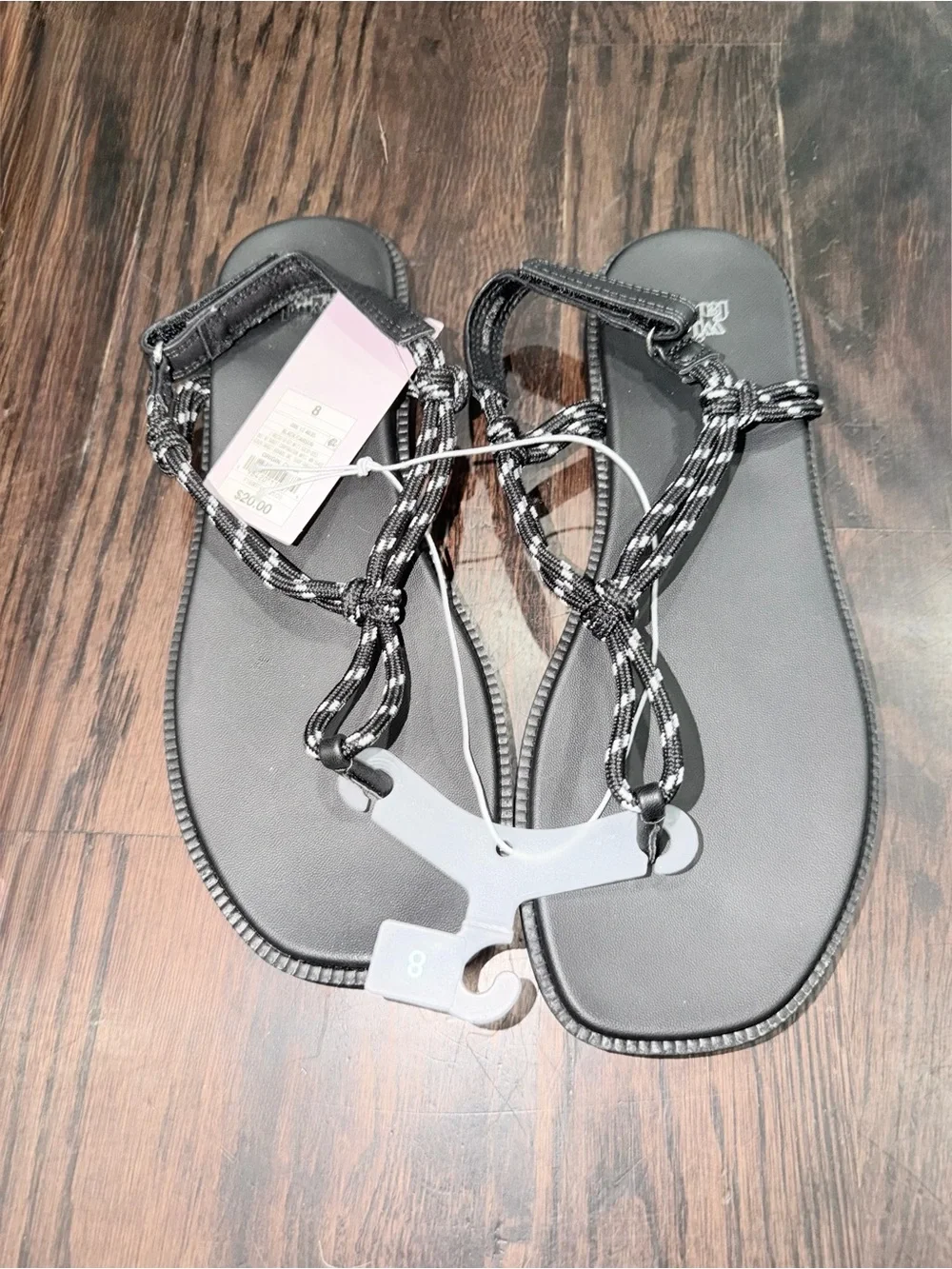 Two pairs of women’s size 8 thong flip-flops